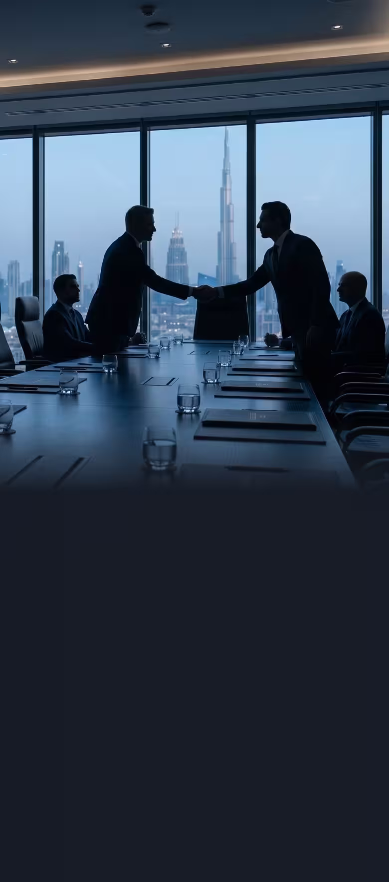 Silhouettes of businesspeople shaking hands across a conference table with a city skyline view.