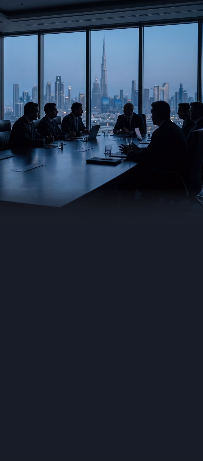 Silhouettes of business people having a meeting at a conference table with a city skyline view.