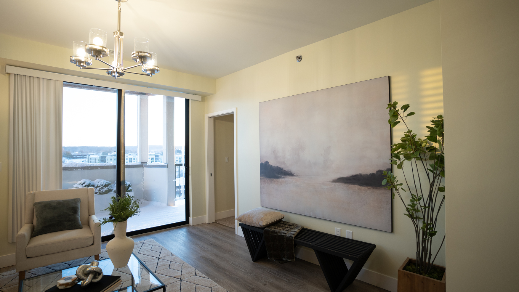 River Rock condominium living room with floor to ceiling windows