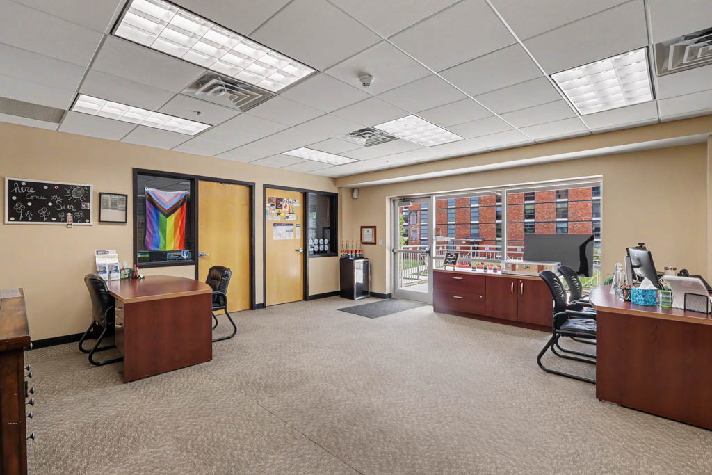 Leasing office with desks and chairs