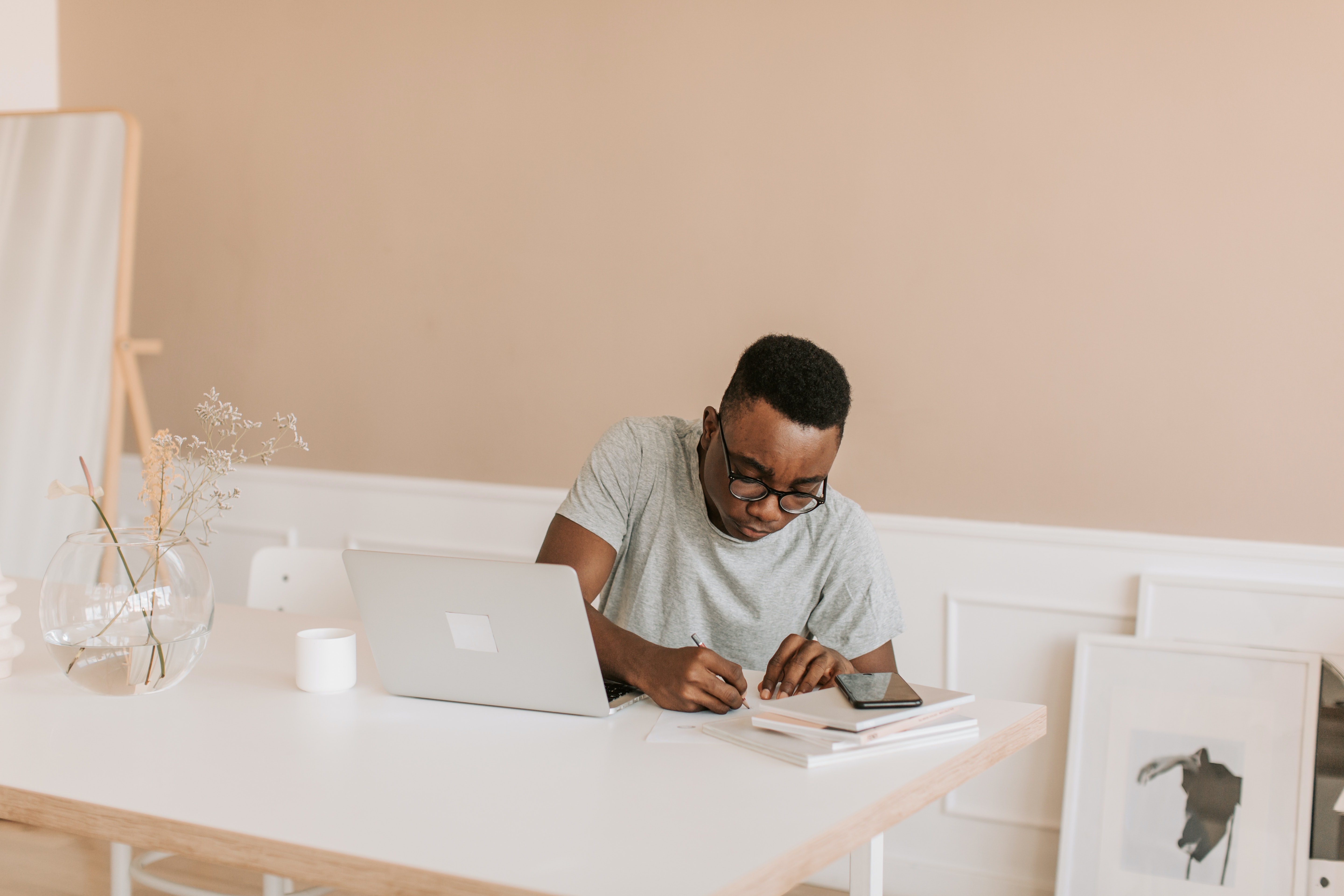 Man working at desk stock image