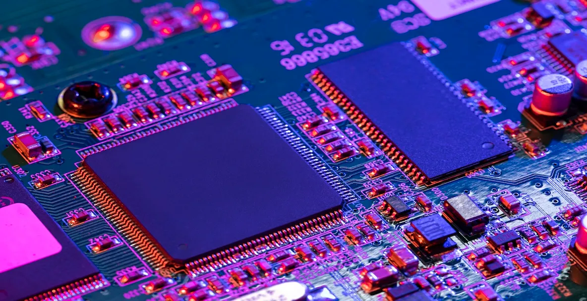 Circuit board with memory ICs under coloured light