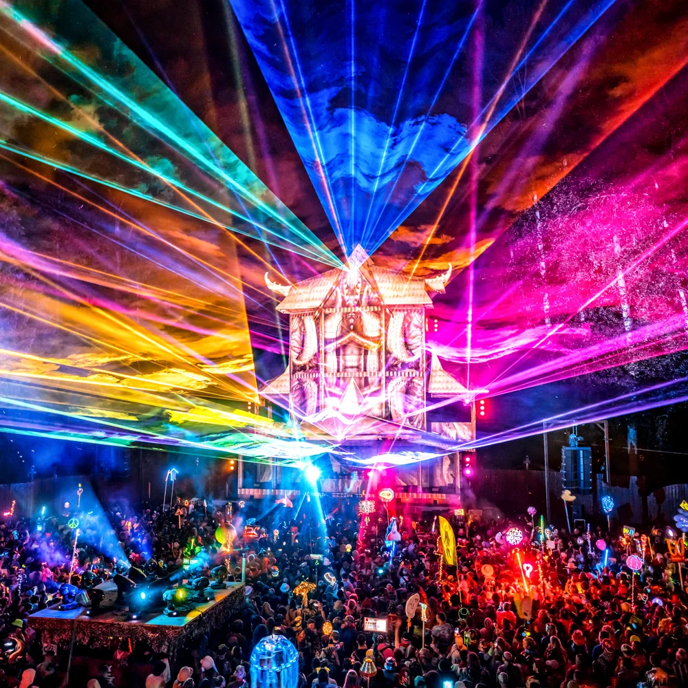 Stunning rainbow of lazer lights at Shambhala Music Festivals Pagoda Stage in the evening