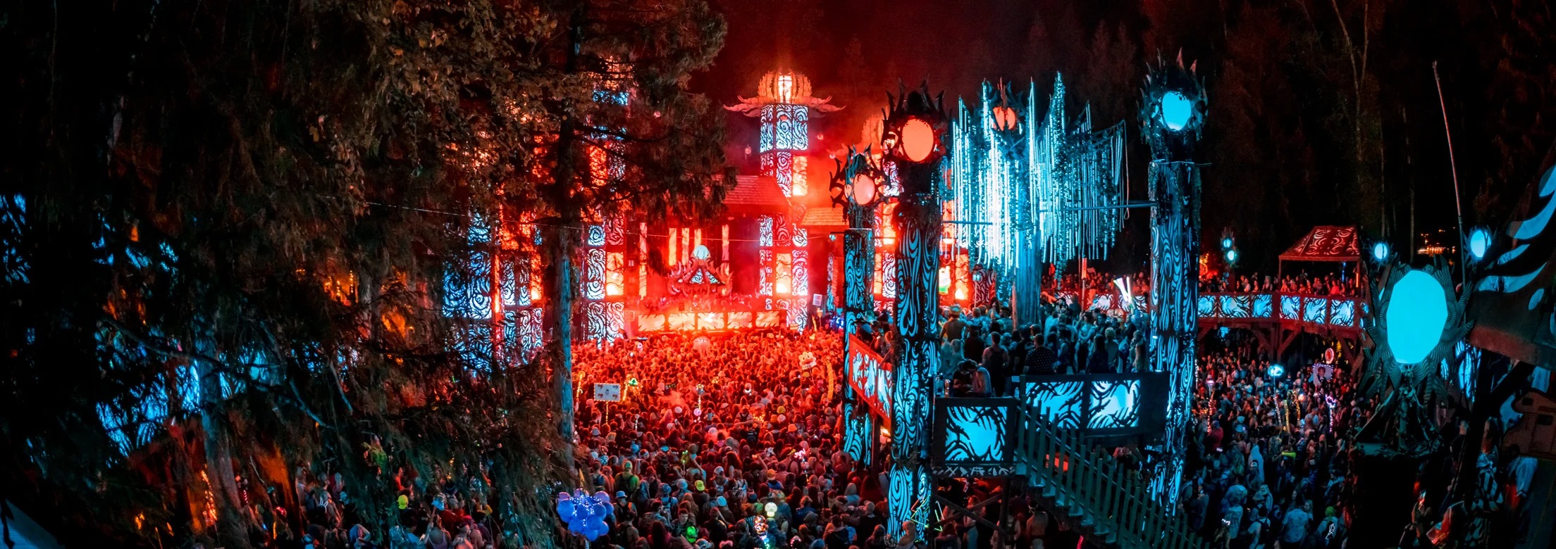 The Village Stage at Shambhala Music Festival - The Village Stage is an experience unlike any other; an immersive environment surrounded by decorated paths and the treehouse walkways of your childhood dreams.