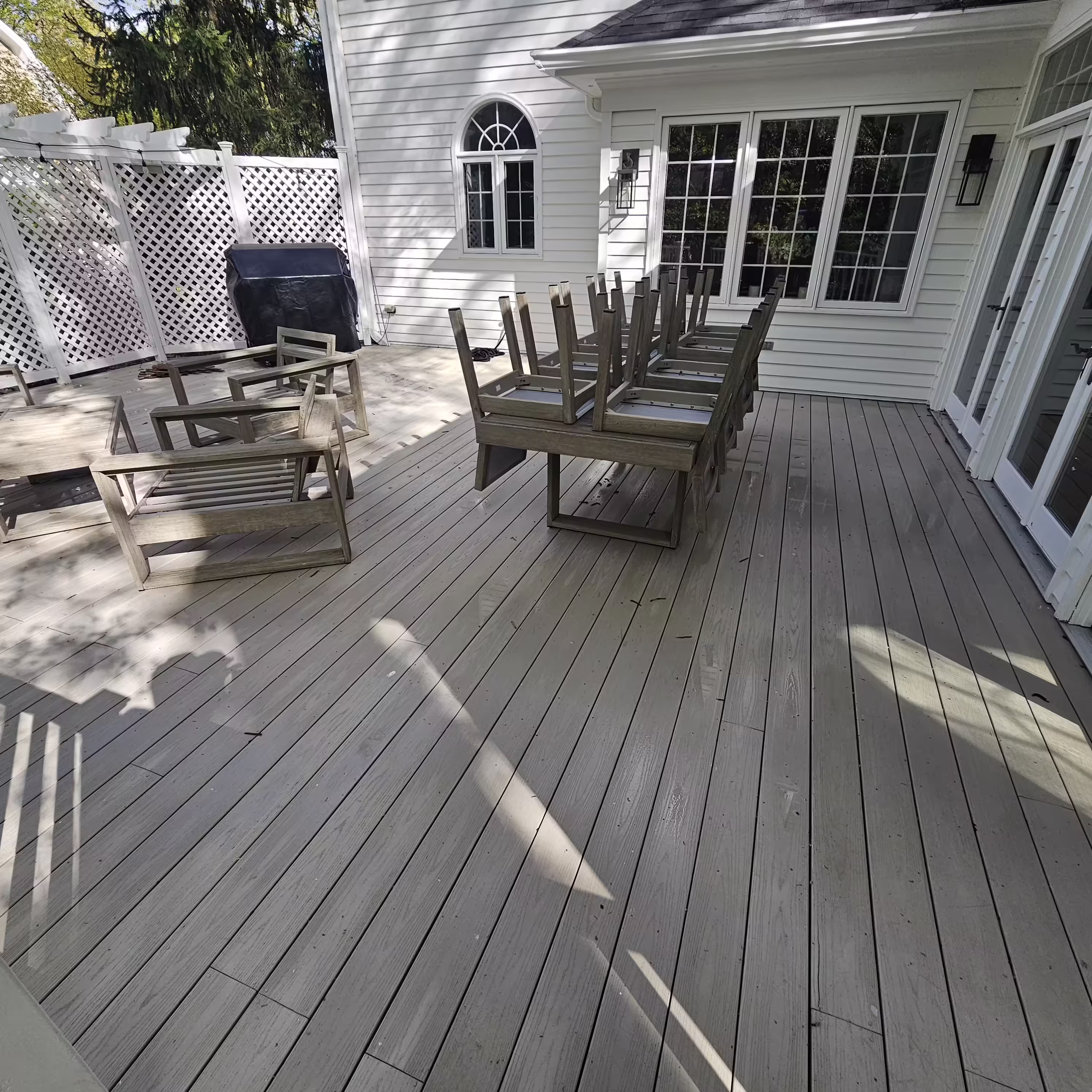 EEC crew cleaning a residential deck in NJ