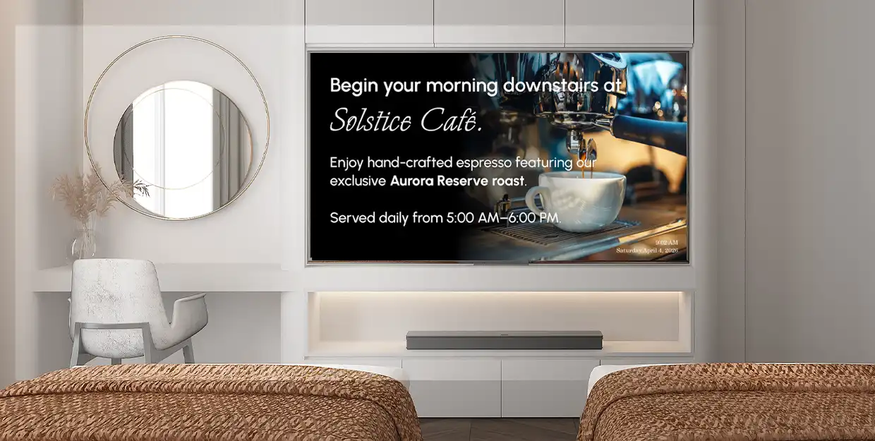 Hotel room showcasing the TV with a custom message advertising the hotel coffee shop.