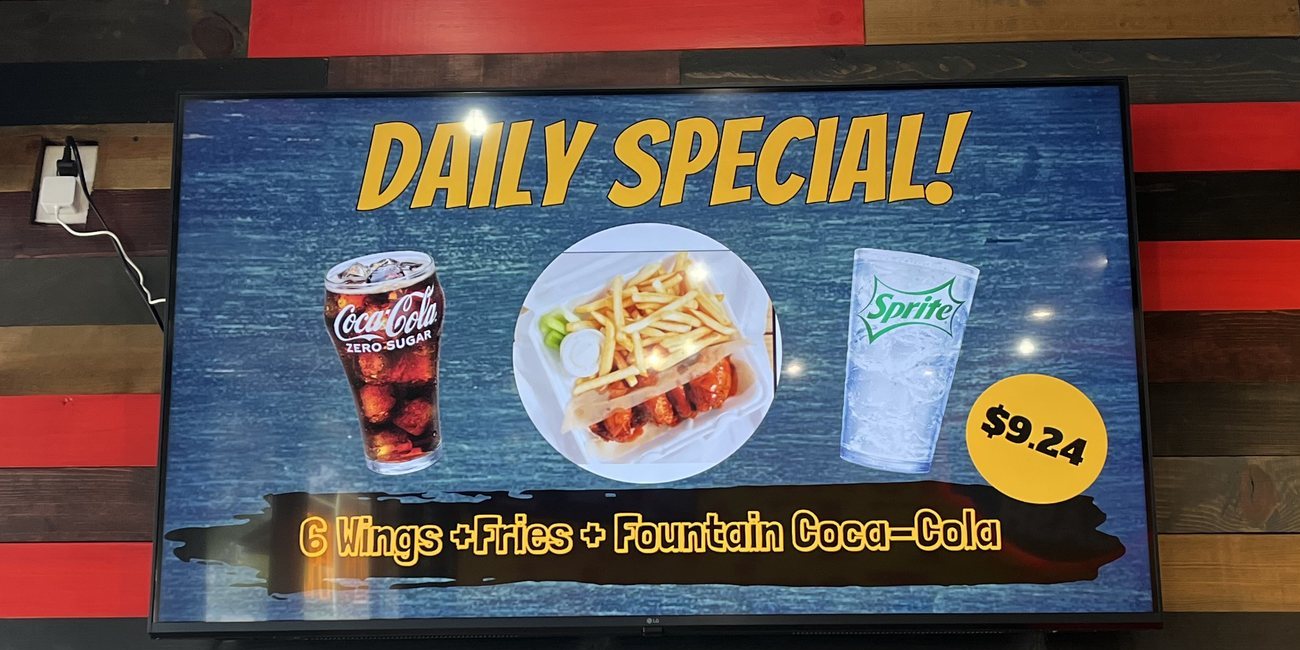 A Daily Special screen at Wing Dash: 6 wings, fries and a fountain drink for 9 dollars 24