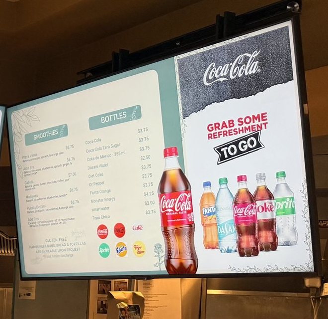 Thistle Cafe's third menu board: a Smoothies list, a Bottles list and a drinks promotion