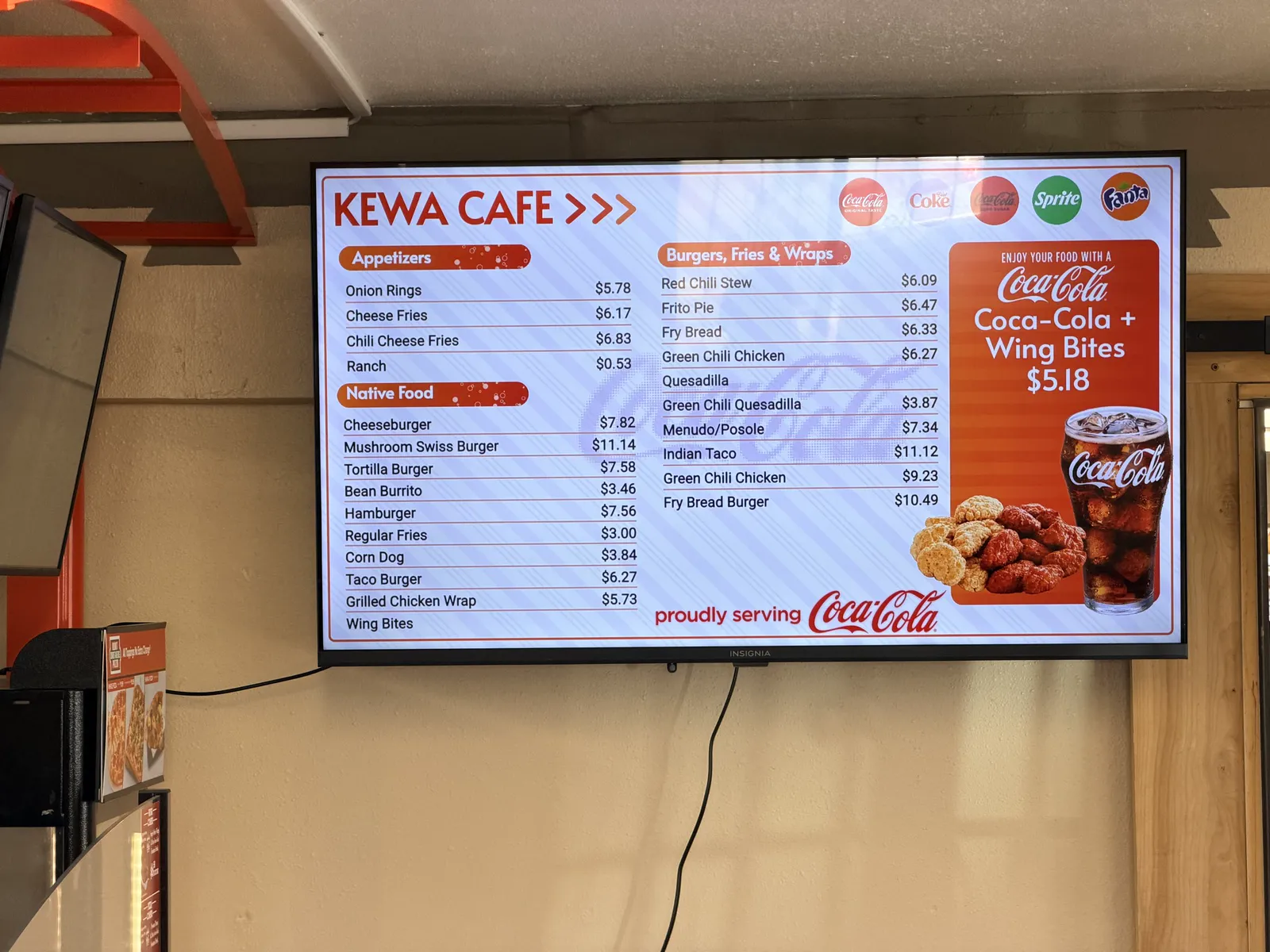 The Kewa Cafe menu board in New Mexico: appetizers, burgers and a Coca-Cola + Wing Bites combo for $5.18