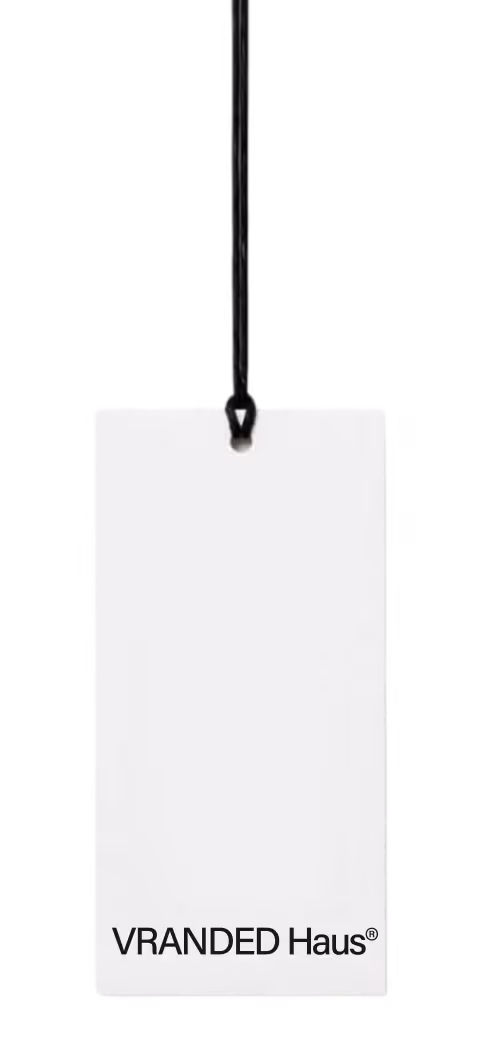 A white rectangular clothing tag hanging from a black string with the text 'VRANDED Haus®' at the bottom.