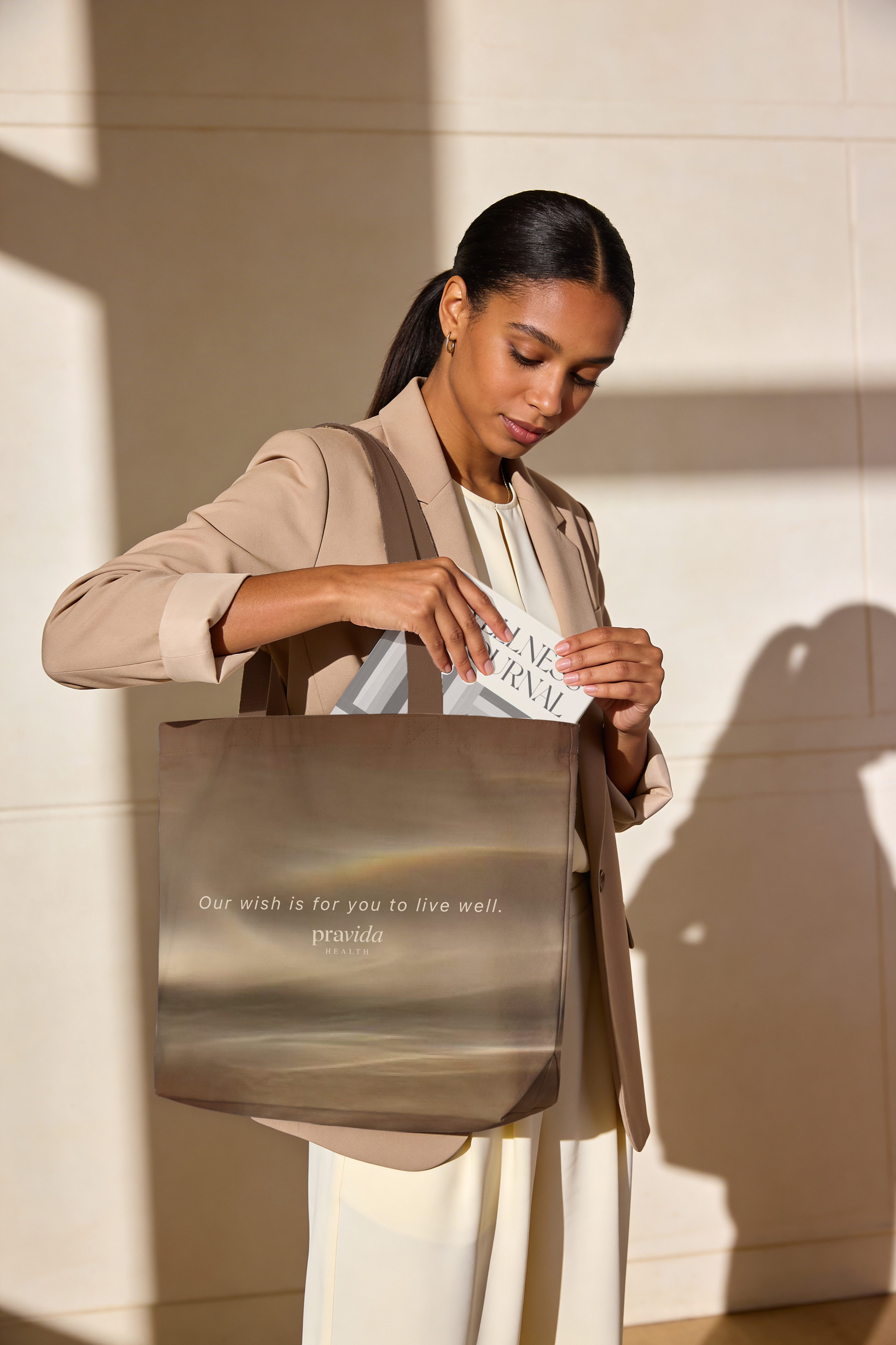 Pravida Health branded tote bag featuring the wellness identity designed by Tantrum Agency