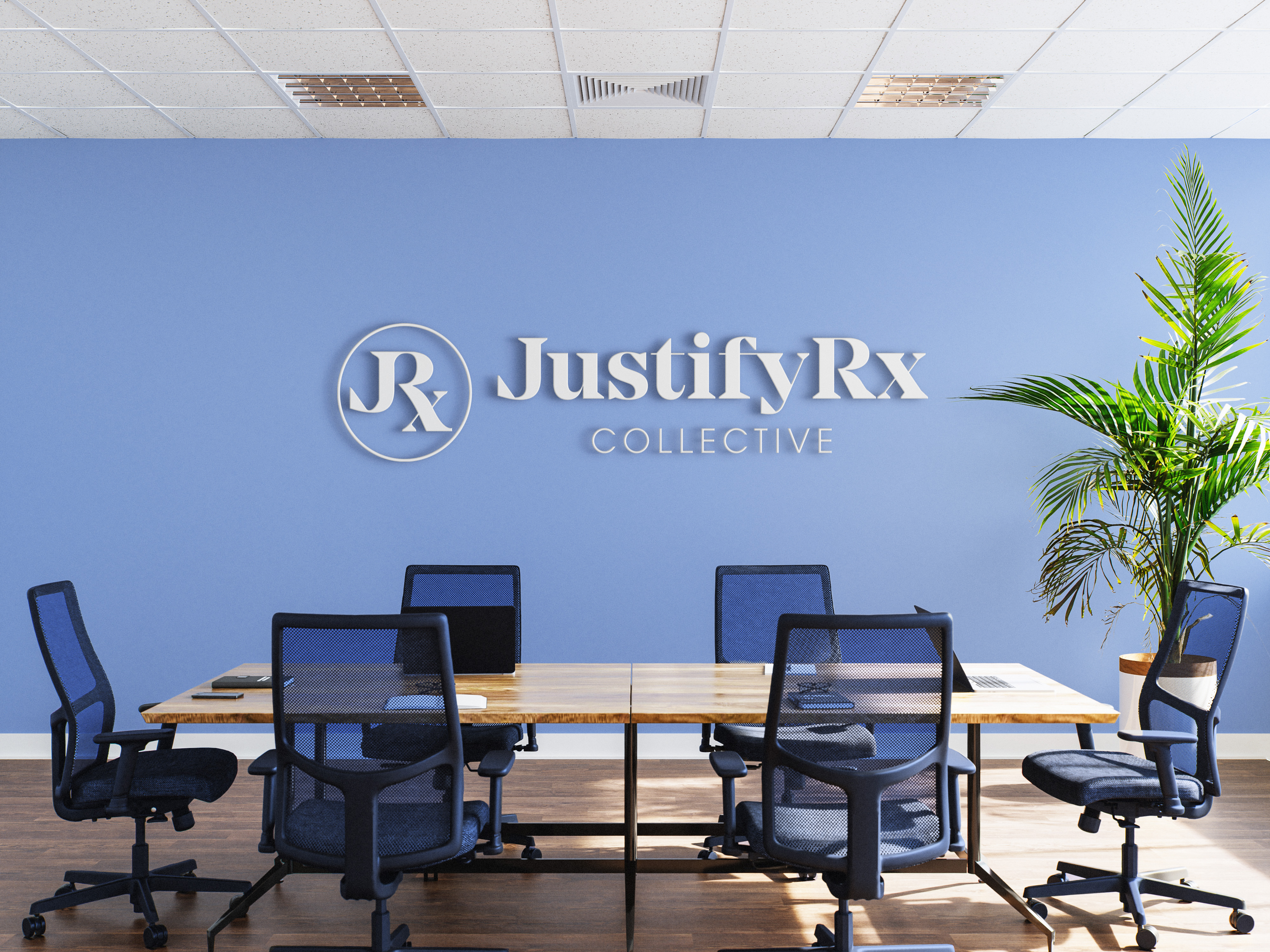 Tantrum Agency brand identity for JustifyRx applied to a professional conference room environment