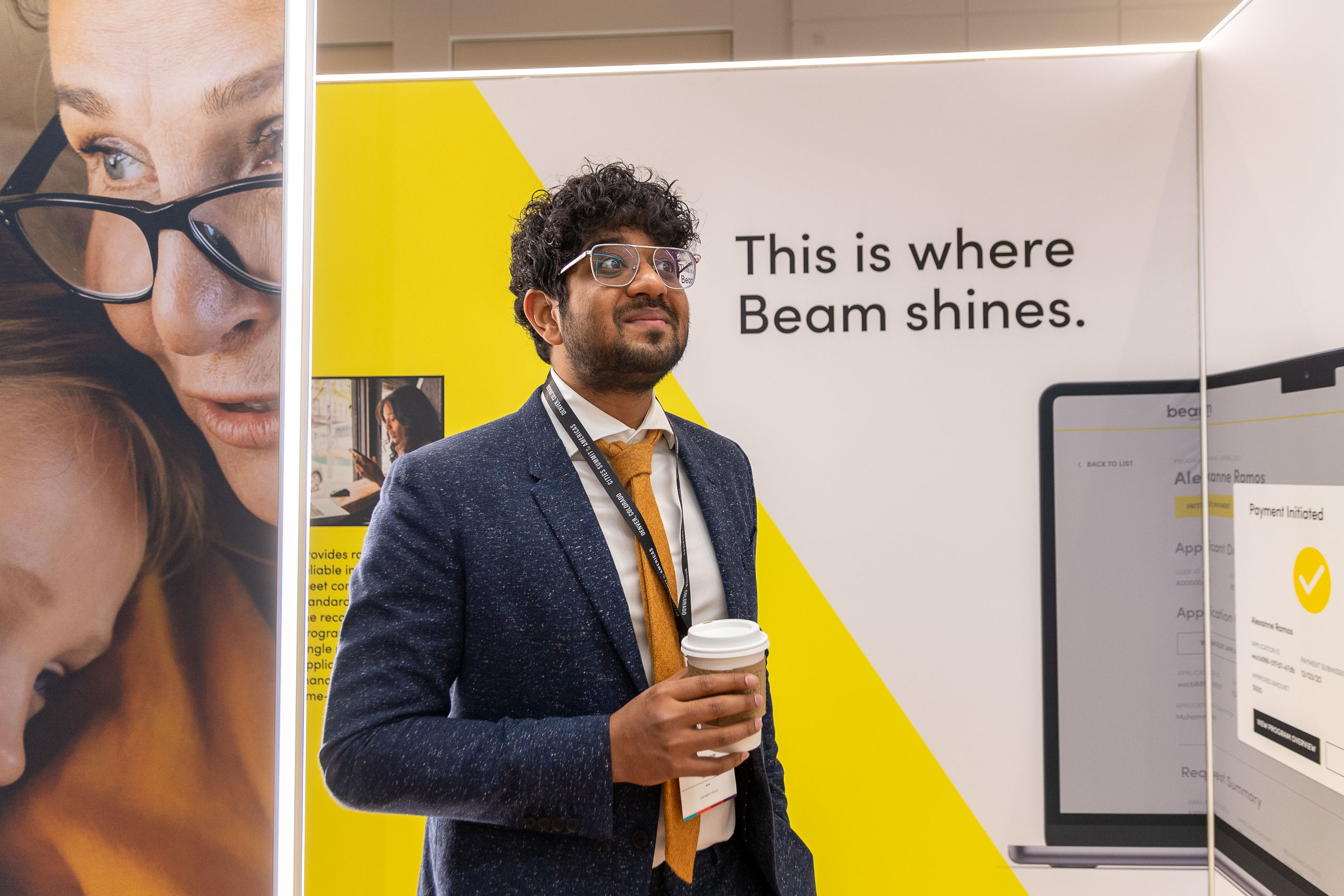 Tantrum Agency Cities Summit brand experience for Beam featuring branded event graphics, a digital product display and conference attendees