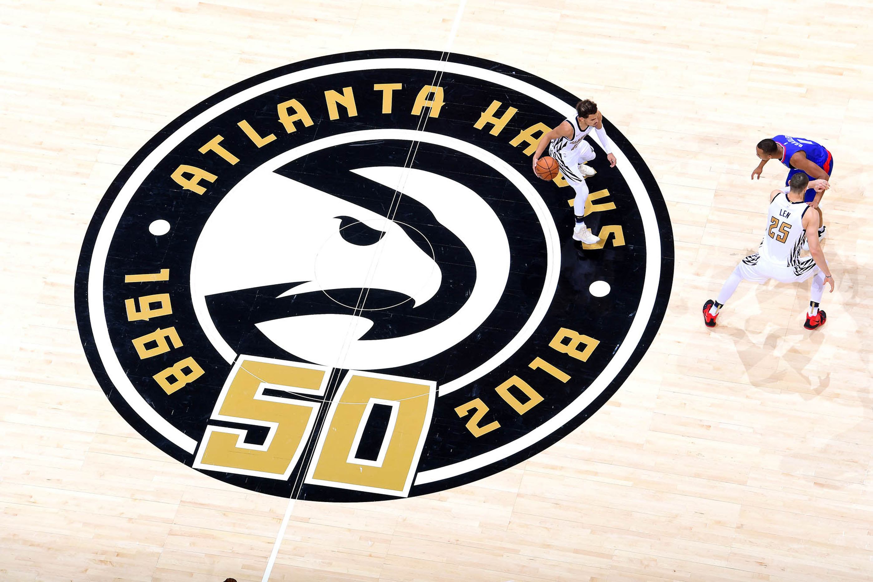Tantrum Agency Atlanta Hawks 50th anniversary logo displayed at center court during game action