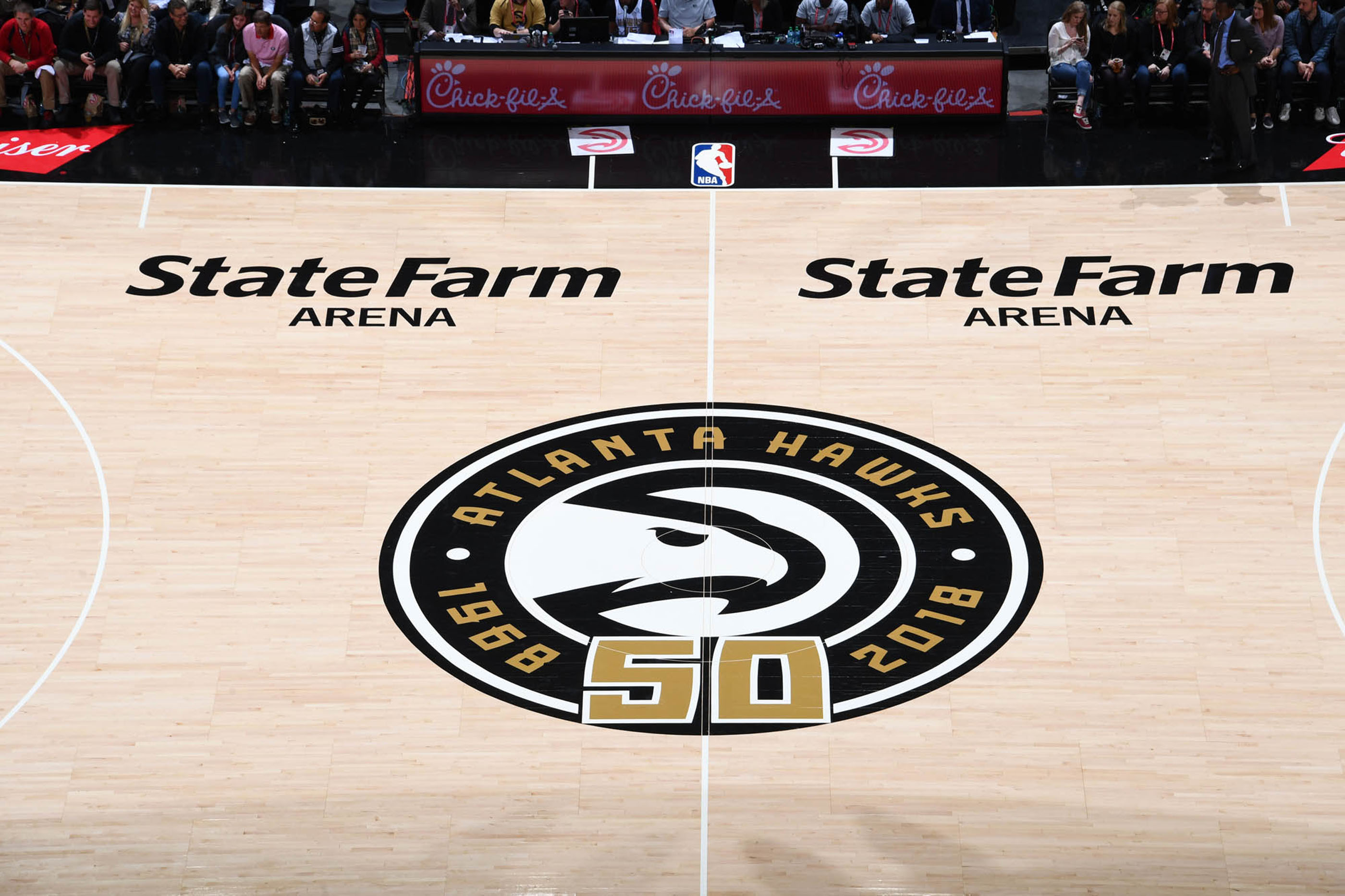 Tantrum Agency Atlanta Hawks 50th anniversary identity displayed as the center-court logo at State Farm Arena