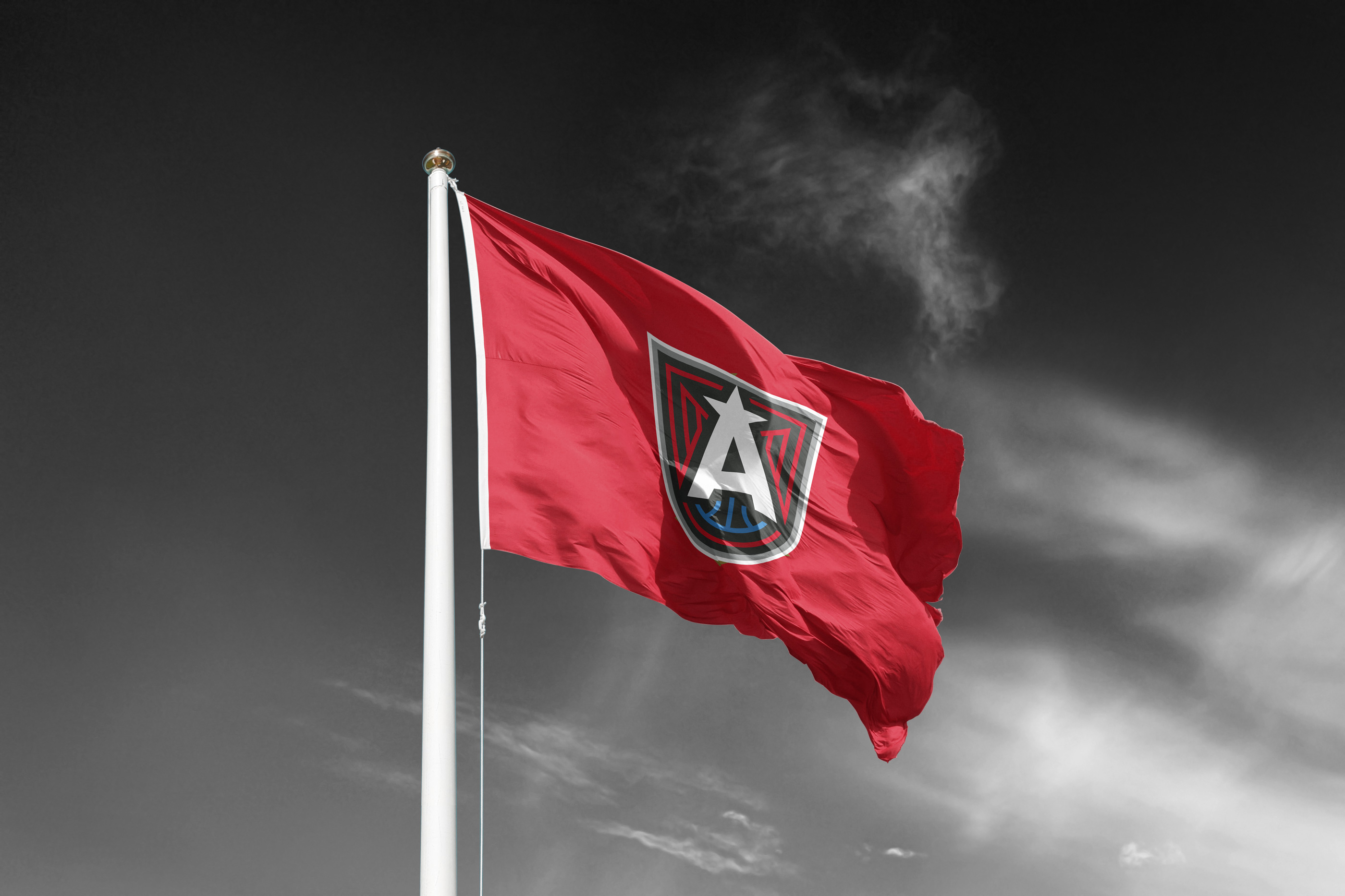 Tantrum Agency Atlanta Dream brand identity applied to a waving flag featuring the team logo and colors