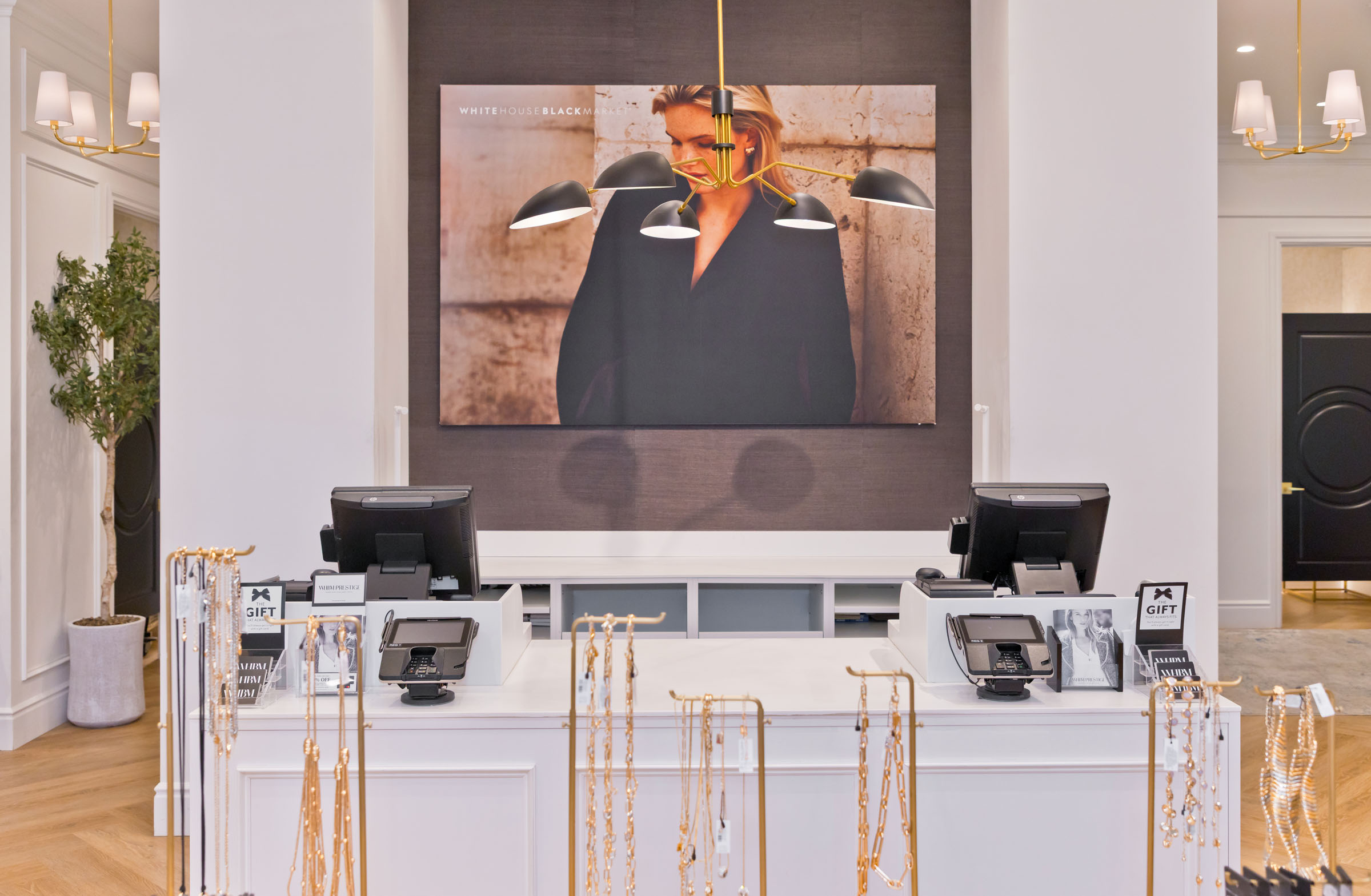 Tantrum Agency Work Kit campaign shown throughout the White House Black Market customer experience