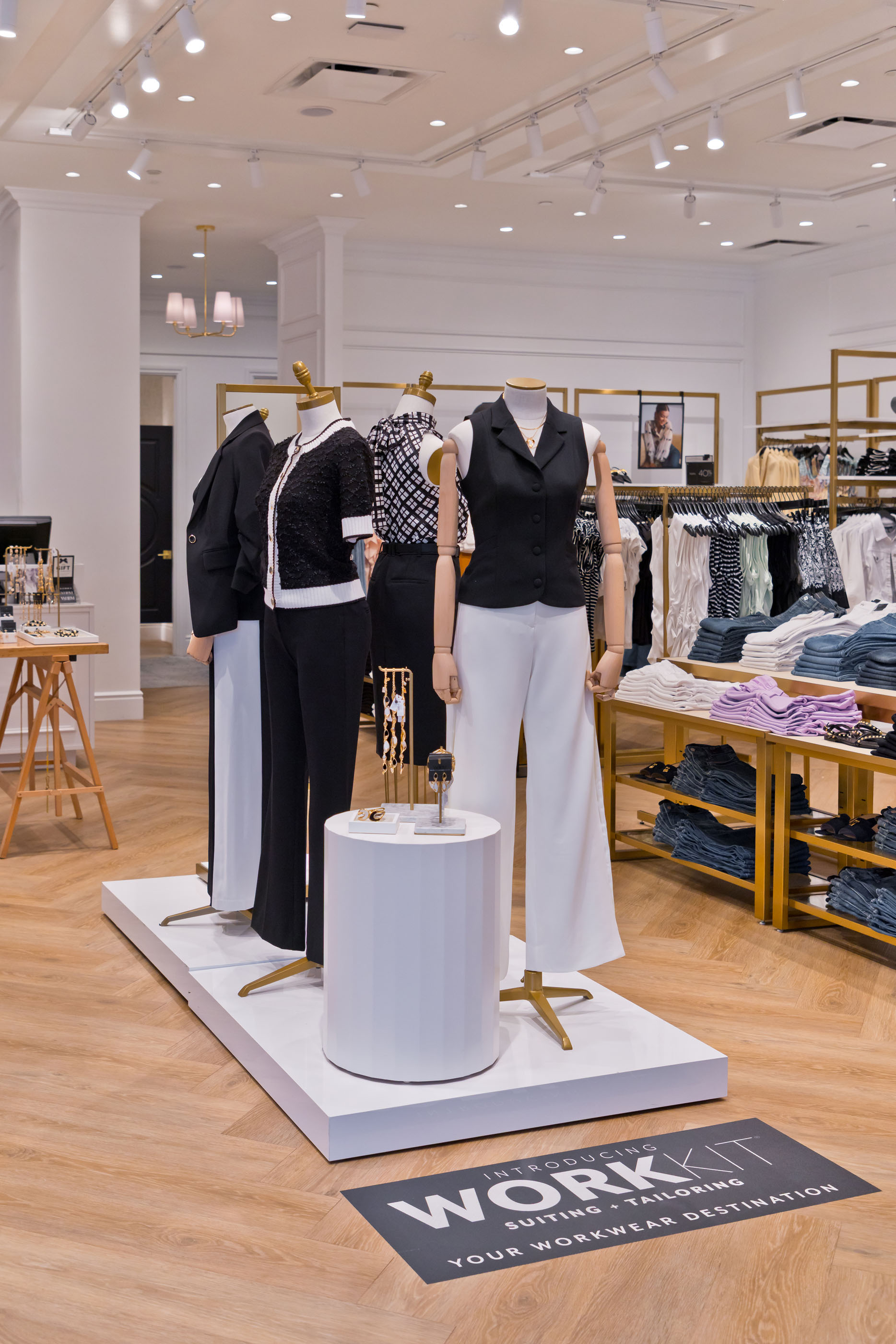 White House Black Market Work Kit creative by Tantrum Agency applied to retail signage and apparel displays