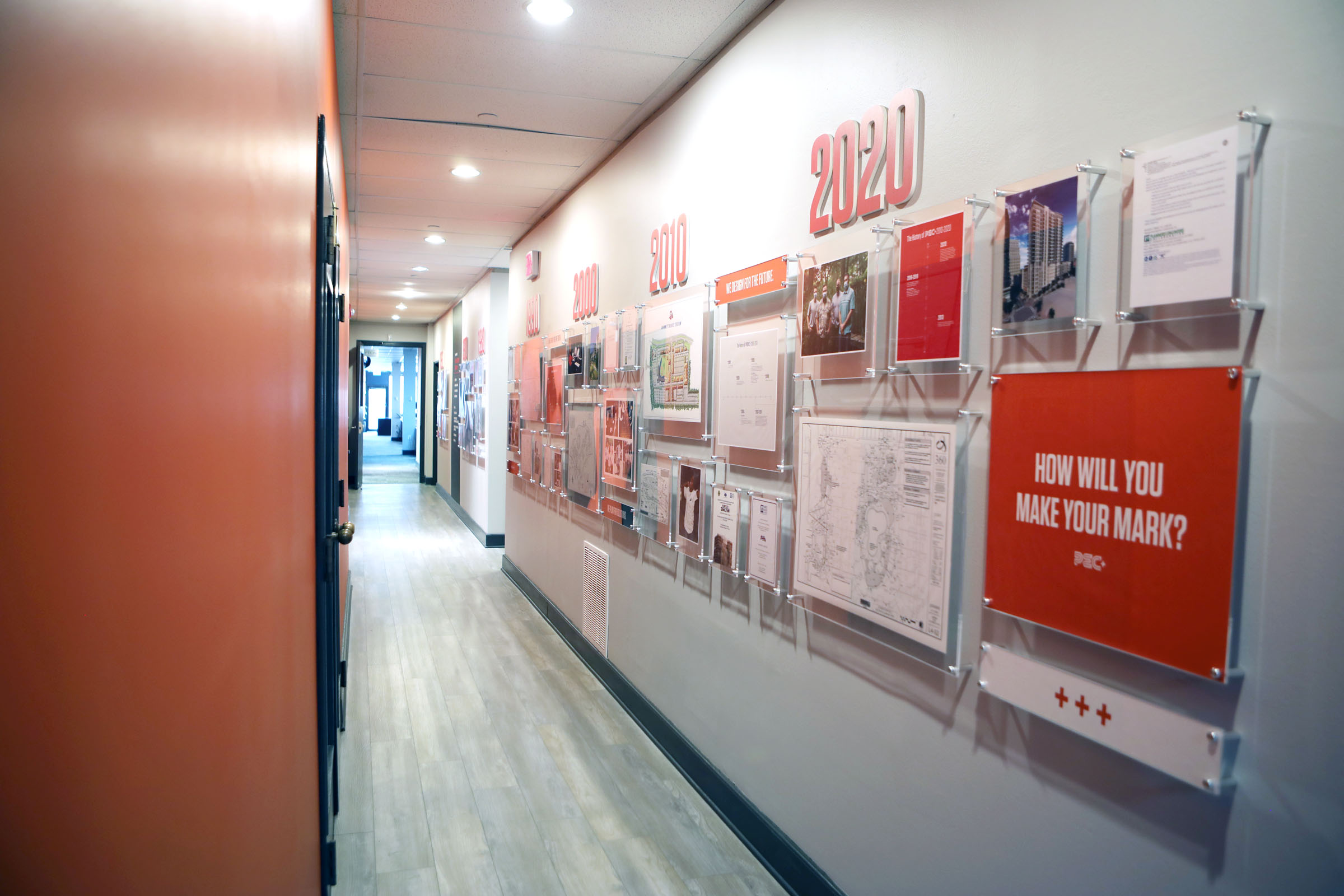 Tantrum Agency environmental branding for PEC+ shown throughout the engineering firm’s office