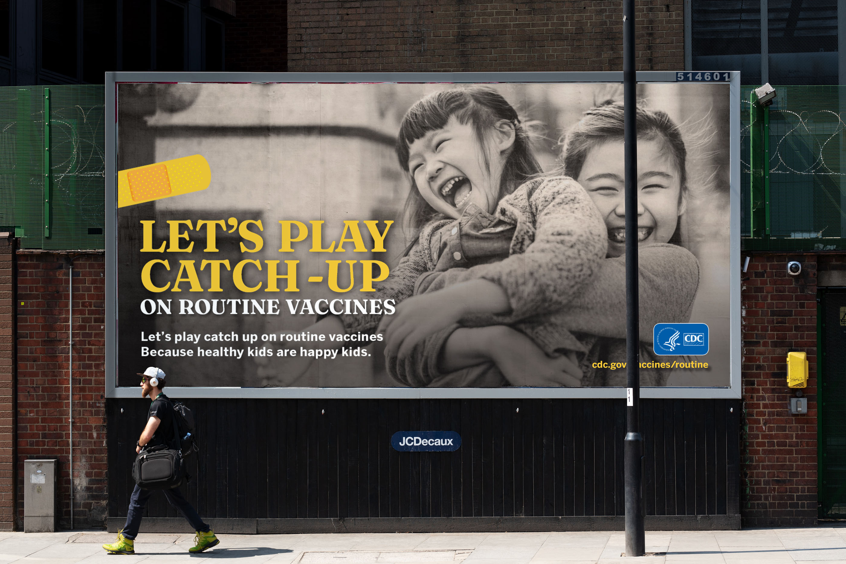 Tantrum Agency Let’s Play Catch-Up public health campaign for the CDC displayed on a large billboard promoting routine childhood vaccination