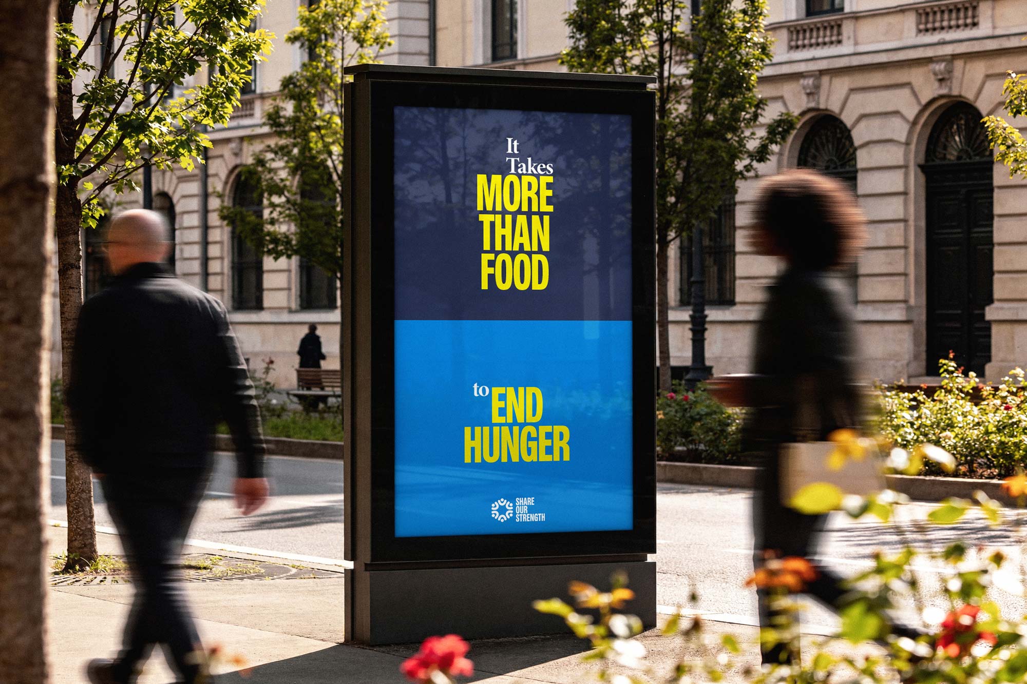 Tantrum Agency Share Our Strength rebrand displayed through large-scale city advertising