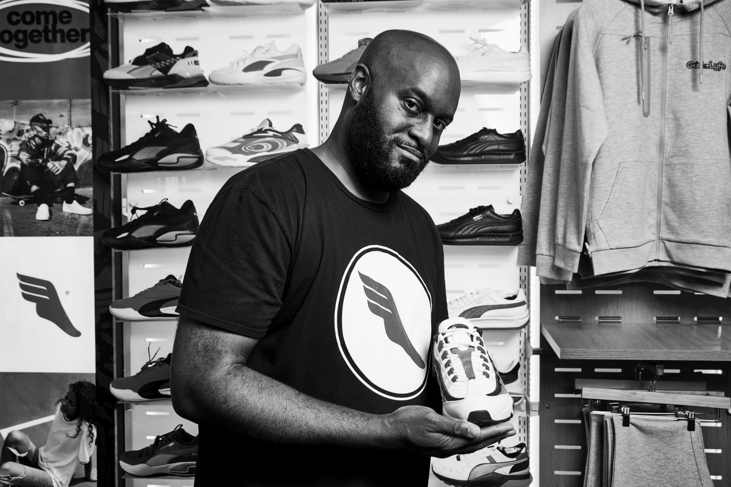 Isom Lowman, The Athlete’s Foot franchisee and StAART mentor, featured in black-and-white program photography