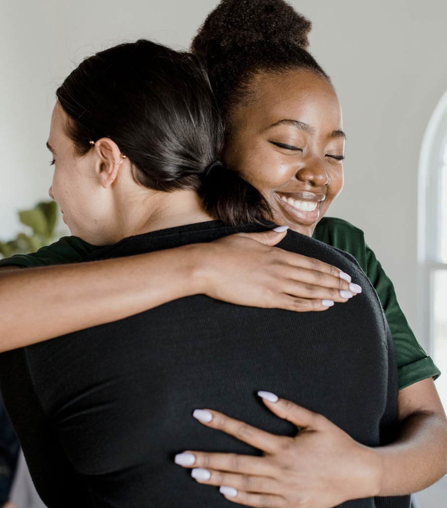 Tantrum Agency brand imagery for Alma Domestic Violence Foundation featuring two women embracing in a supportive moment