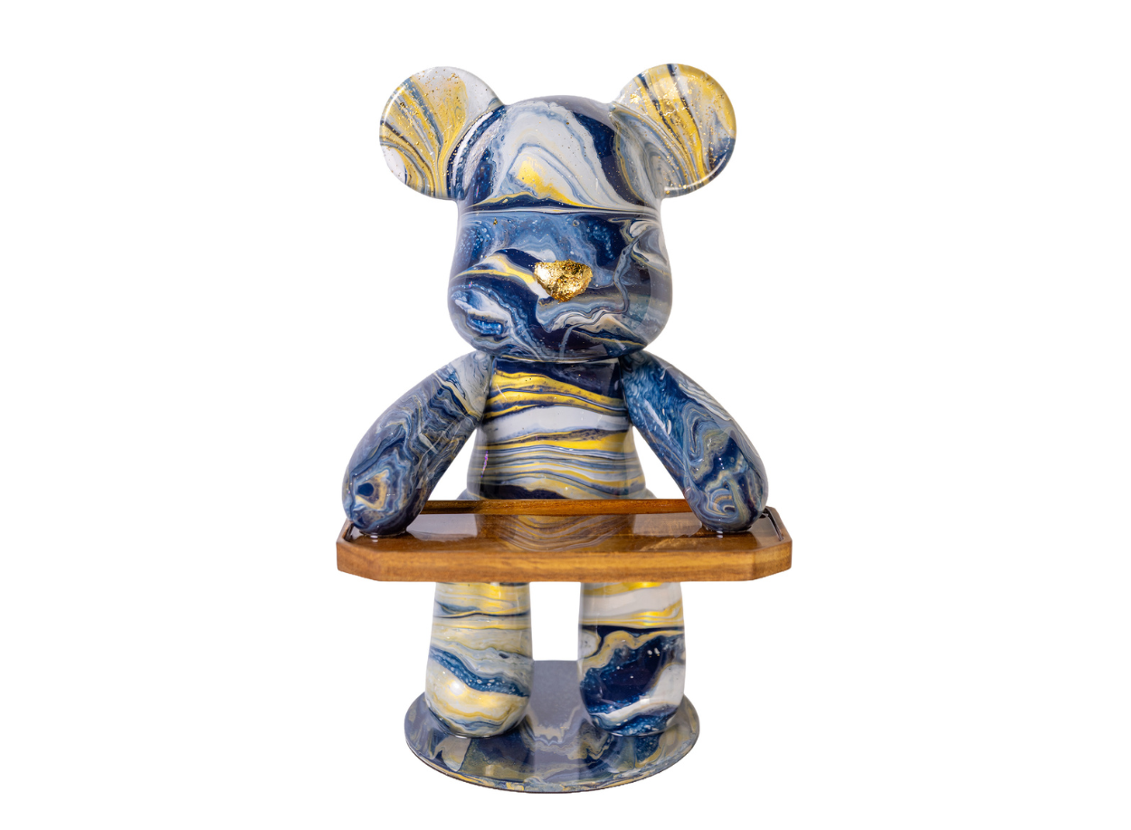 A bold oversized teddy sculpture with a built-in tray for both style and function. Use it as a side table accent, coffee server, entryway catchall, bathroom accessory holder, or statement décor piece that instantly starts conversations. Includes the full experience, all materials, and your finished sculpture professionally coated with a high-gloss resin finish.