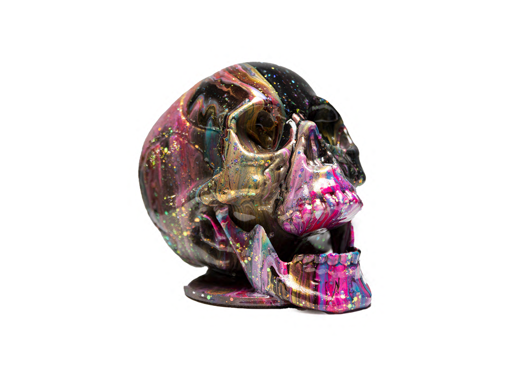A bold skull sculpture with a modern abstract twist that makes a unique statement piece for shelves, desks, mantels, or seasonal décor. Includes the full experience, all materials, and your finished sculpture professionally coated with a high-gloss resin finish. Available August 19–December 31, or until supplies last.