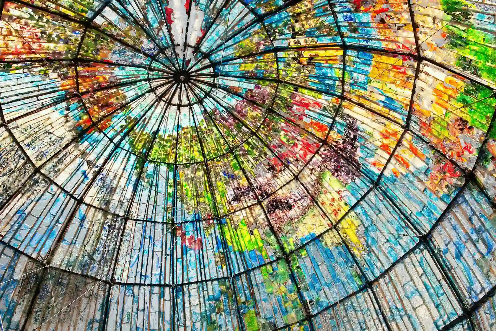 Victorins - colorful stained glass dome ceiling with radial black metal framework
