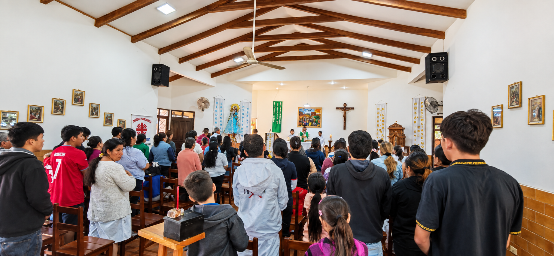 A congregation gathered for worship in a chapel.