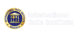International Taste Institute logo featuring a golden circle with three stylized fork and spoon icons, text reads International Taste Institute Brussels.