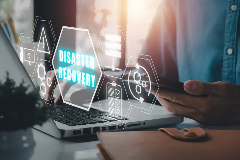 Disaster Recovery concept, Person hand using laptop computer