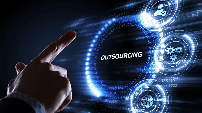 Business, Technology, Internet and network concept. Young business man writing word: Outsourcing