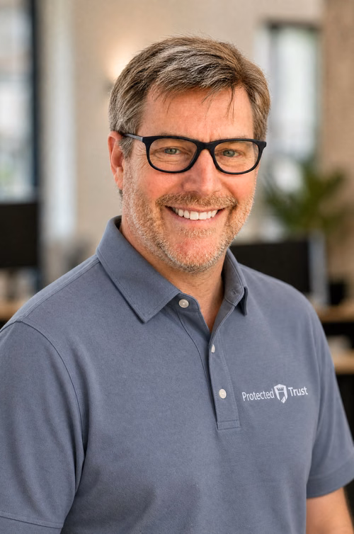 Ingram Leedy smiling in a Protected Trust polo, Orlando MSP team member