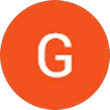 Orange circle with a white capital letter G in the center.