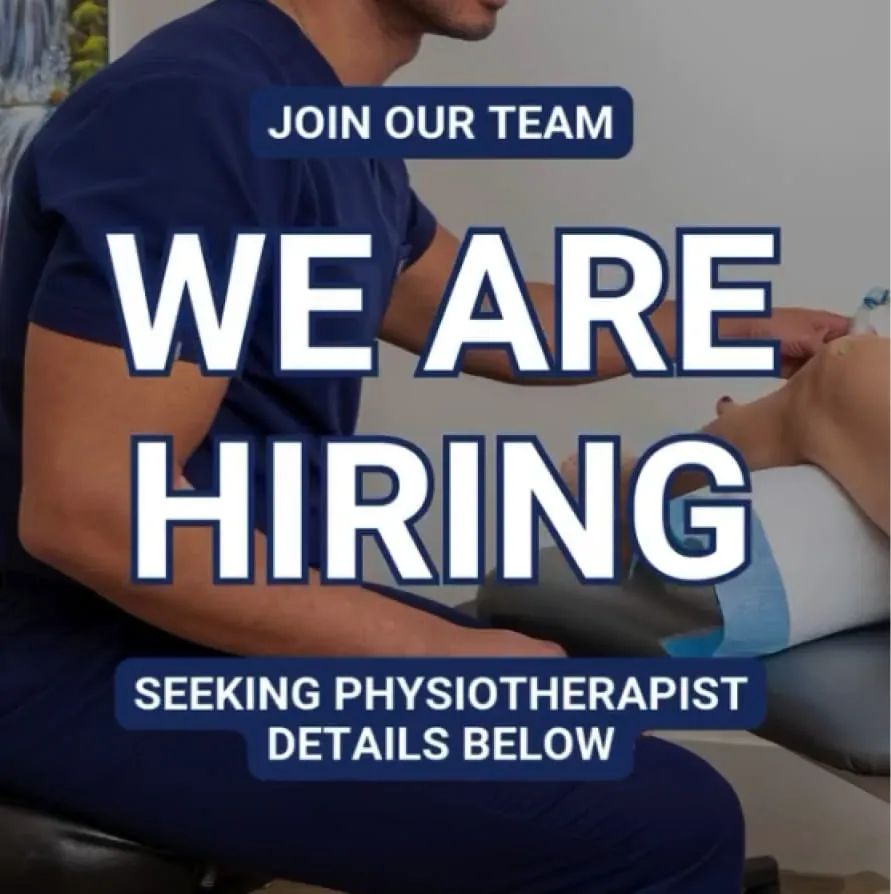 Healthcare professional in navy scrubs performing physiotherapy on a patient's leg, with overlaid text reading 'Join Our Team, We Are Hiring, Seeking Physiotherapist, Details Below'.