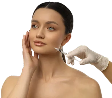 Woman with clear skin receiving a cosmetic injection on her cheek from gloved hand.