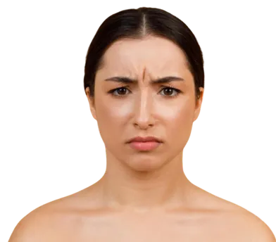 Young woman with dark hair frowning, showing prominent forehead wrinkles.