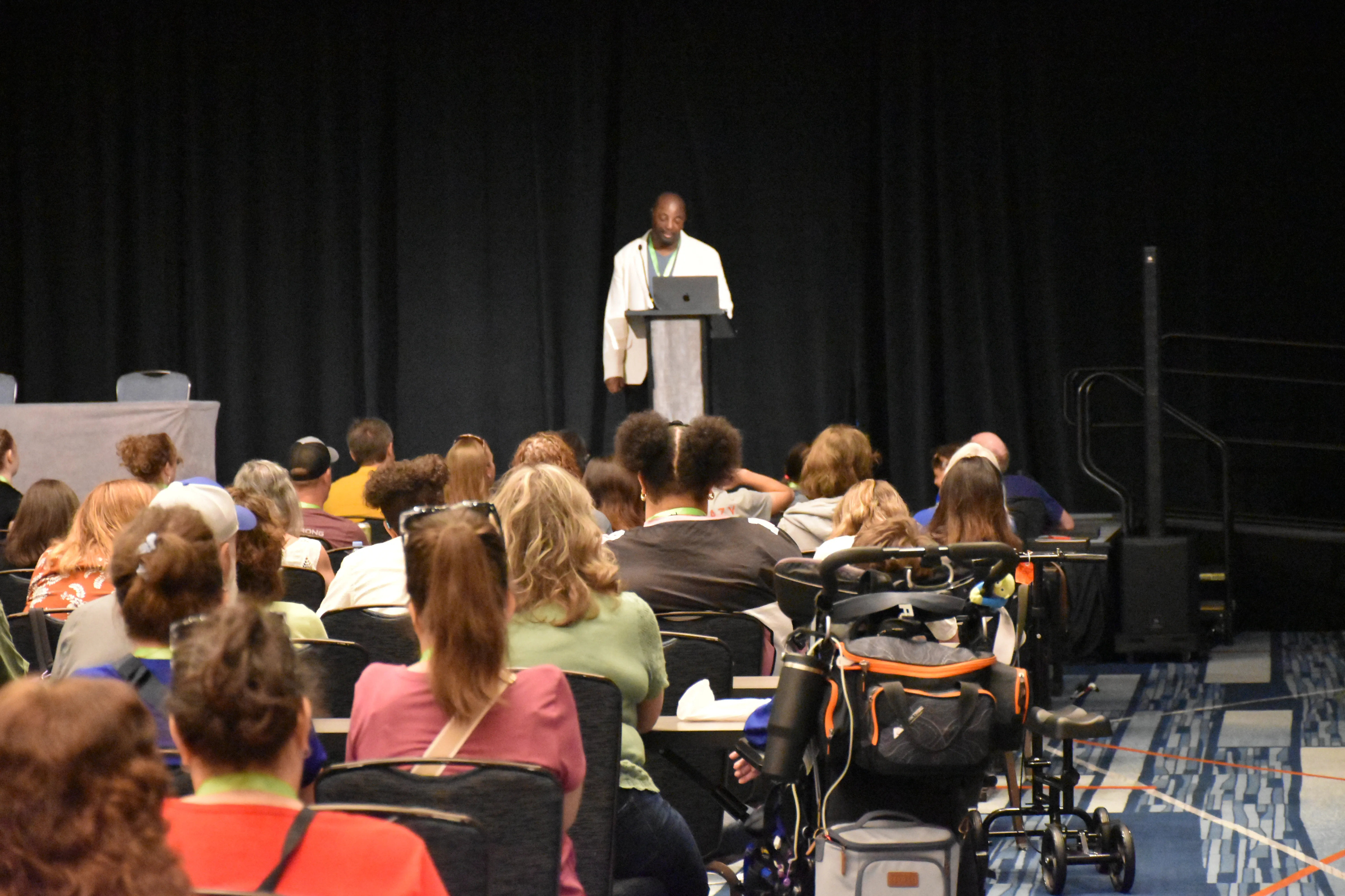 Families listen during an educational session at the Retreat