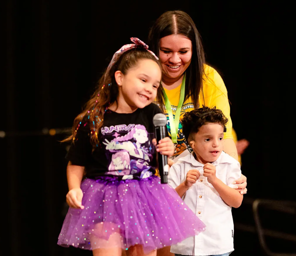 A child dances at the Retreat's talent show