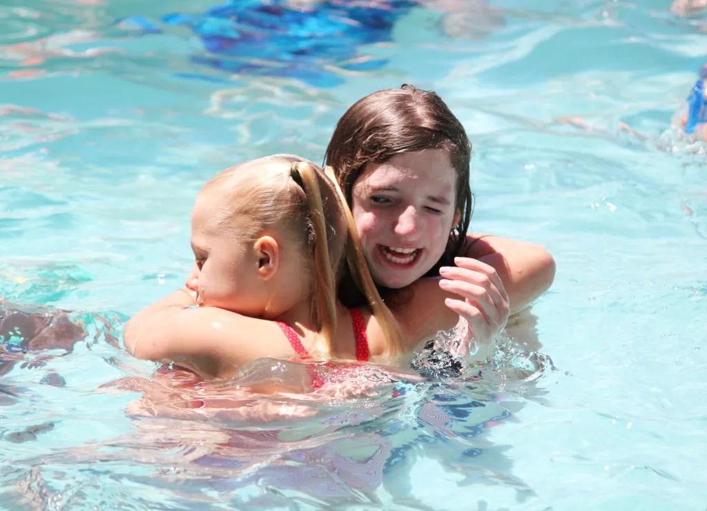 A child swims during a CCA pool event