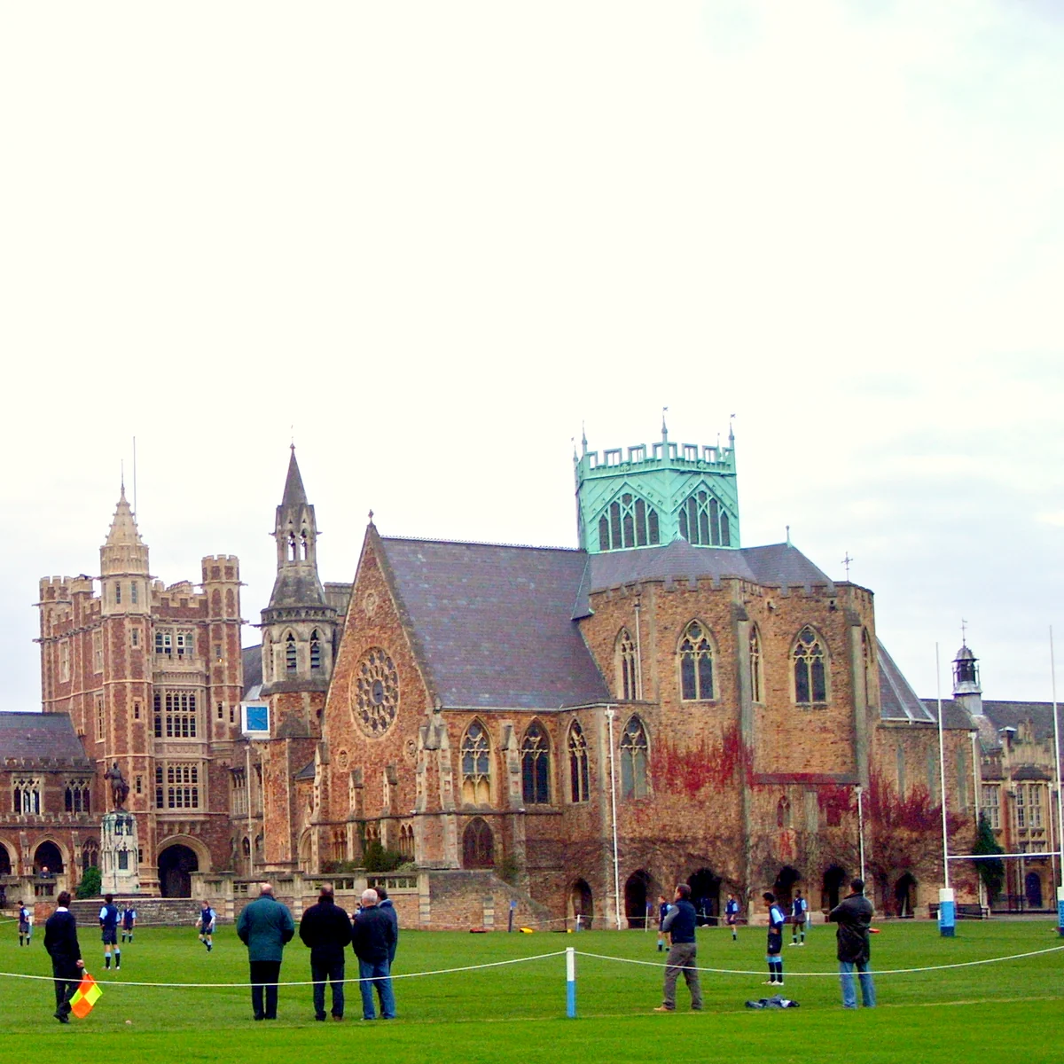A rugby match on the Close at Clifton College, with Big School and the chapel tower beyond.
