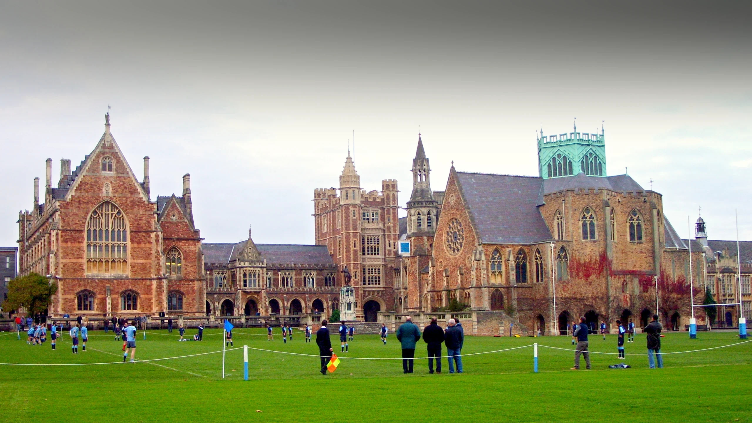 A rugby match on the Close at Clifton College, with Big School and the chapel tower beyond.