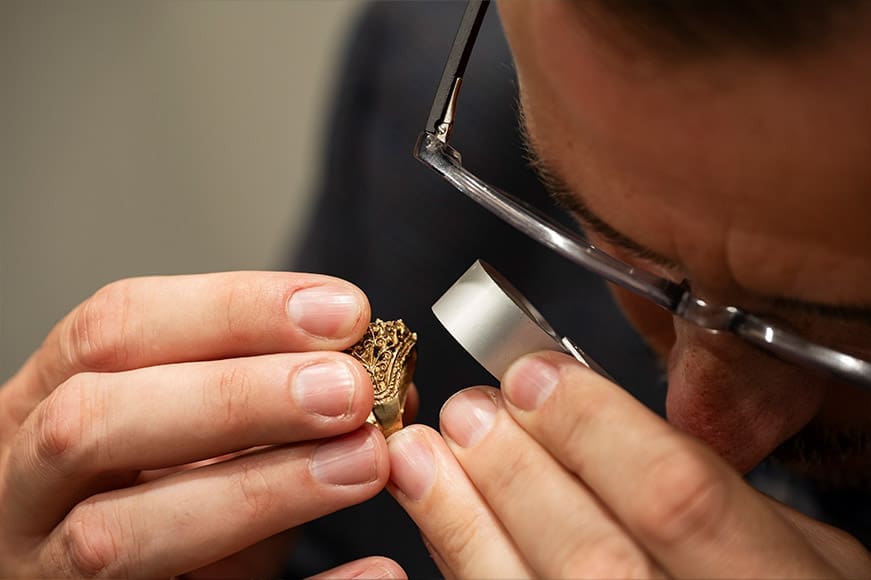 Gold Ring Being Assessed
