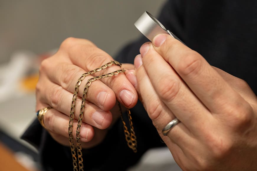 Gold Necklace Being Valued for Resale