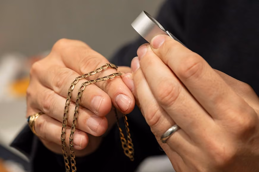 Inspecting a Gold Chain