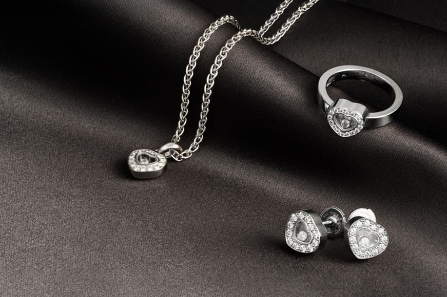 Chopard happy Diamond Pendant, ring and earrings in White gold
