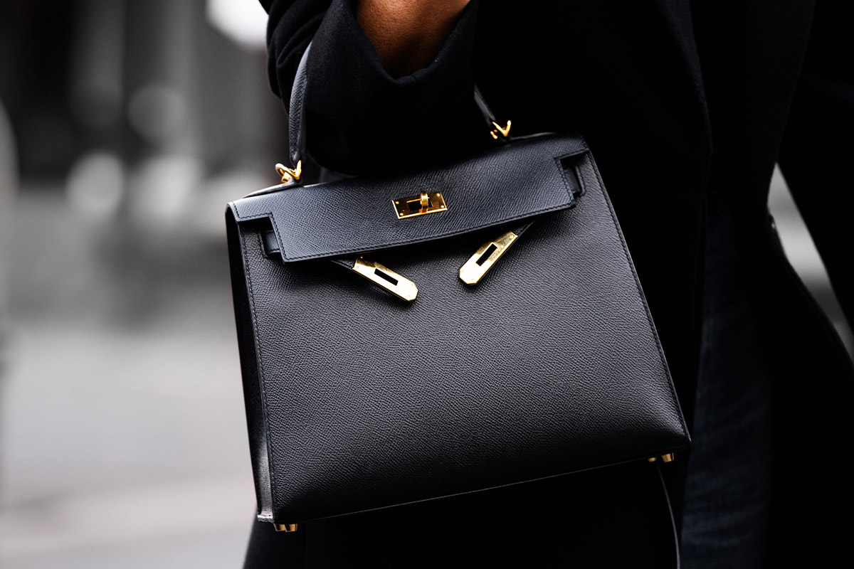 Real Hermès Birkin on woman's arm