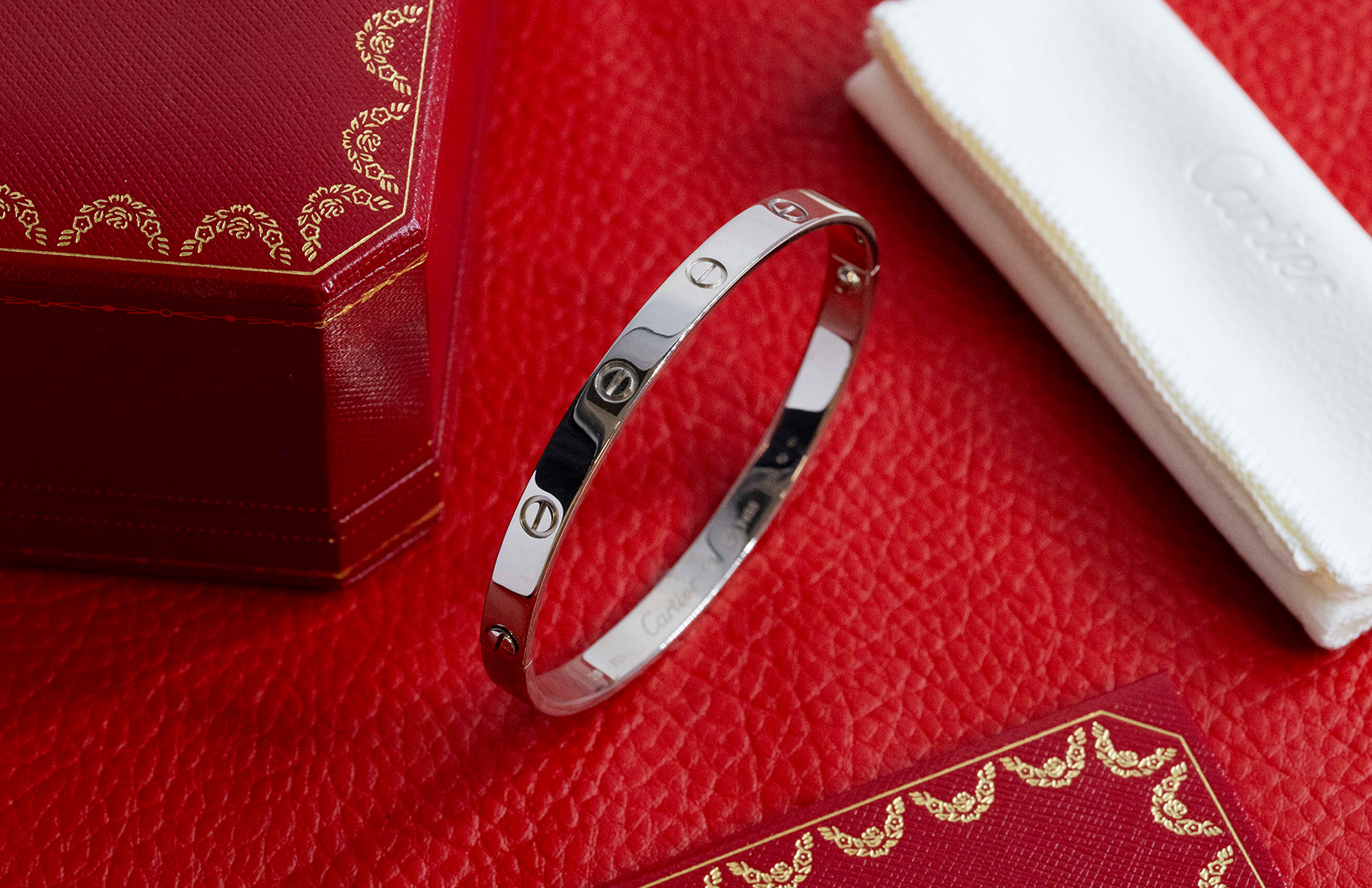 cartier love bangle with red cartier box